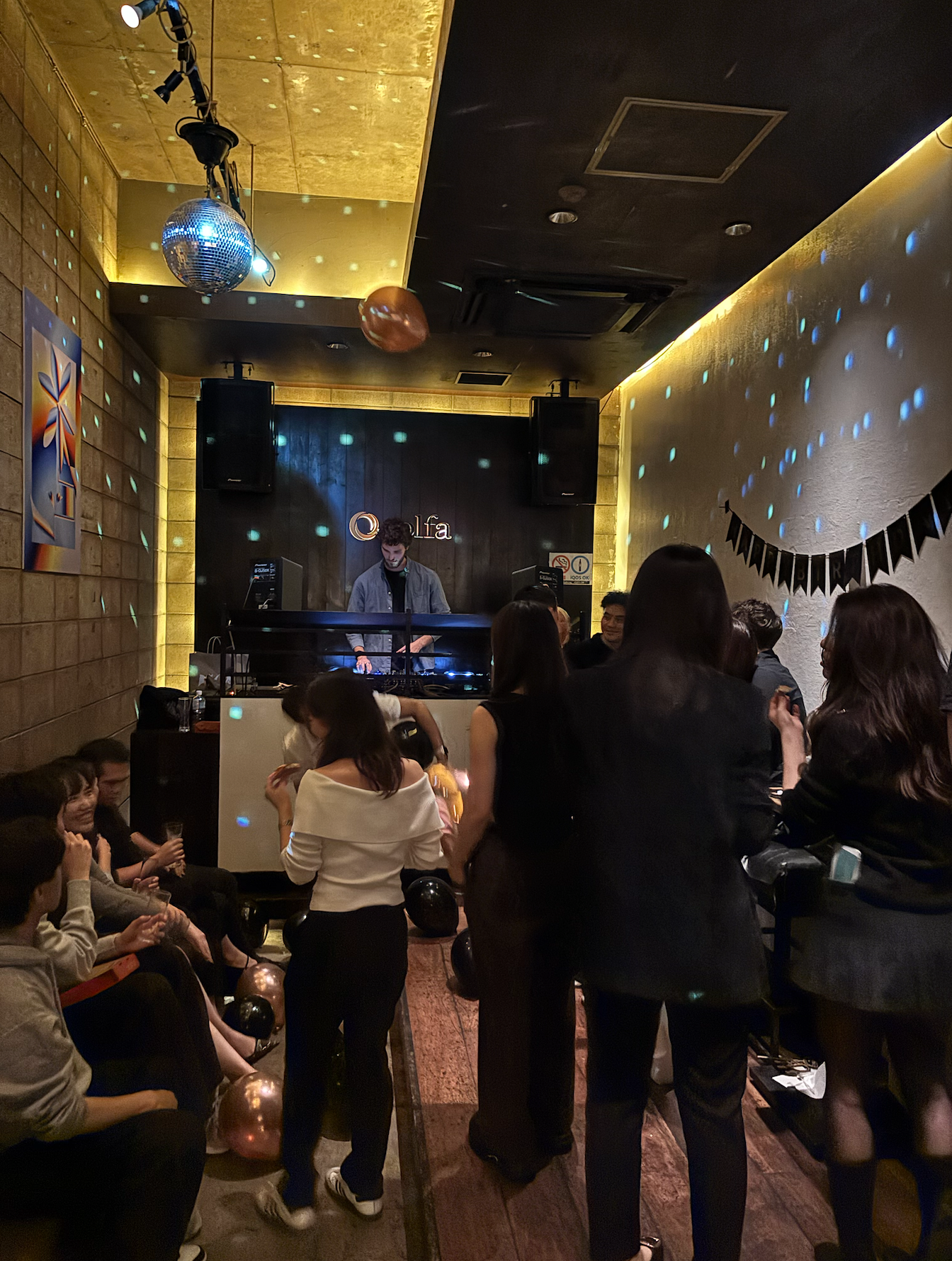 Guests enjoying a DJ set at the venue